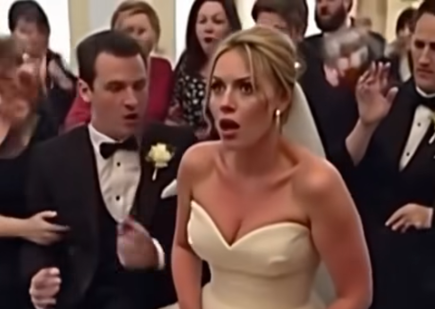 As the wedding unfolded, a mysterious motion beneath the brides dress made the groom turn ghostly white